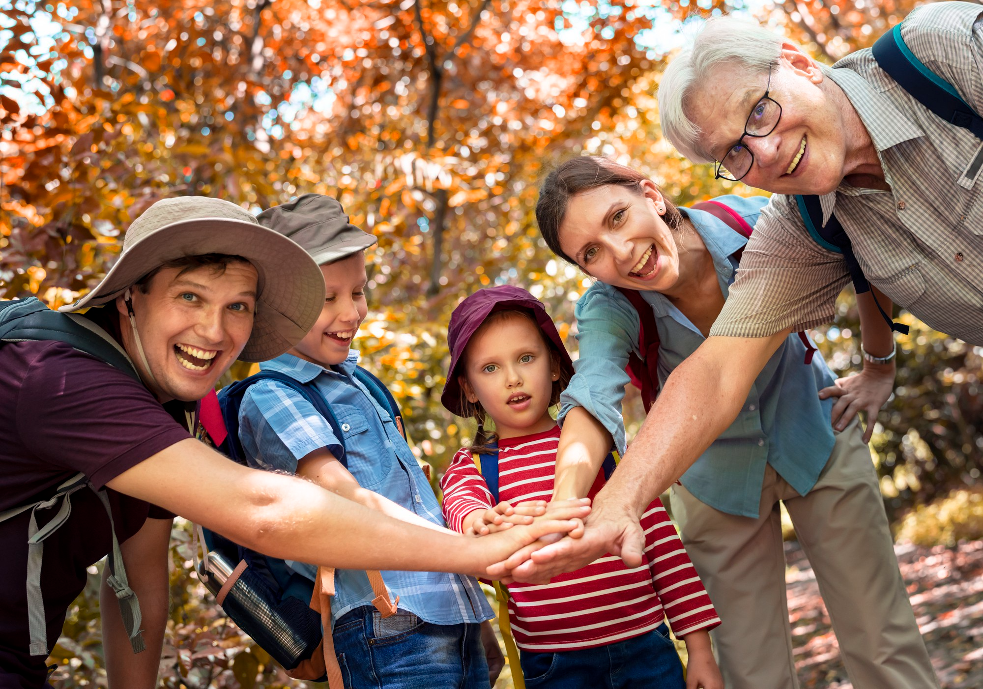 Families gathered together outdoors in autumn